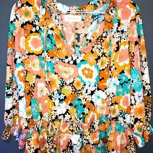 Brand: Melloday. In size XL. Price: $10.00 Floral imprints stretchy material